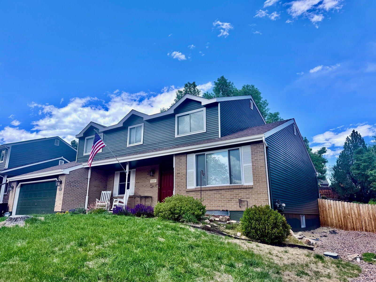 Freshly painted two-story Denver home exterior by Kind Home Painting